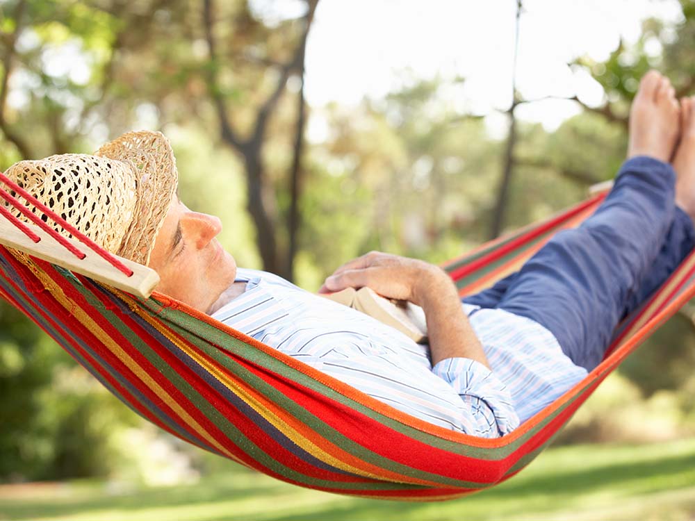 Dad relaxing in a hammock.